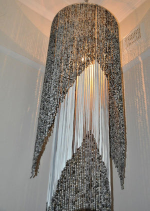 African mama chandelier. white pearl resort